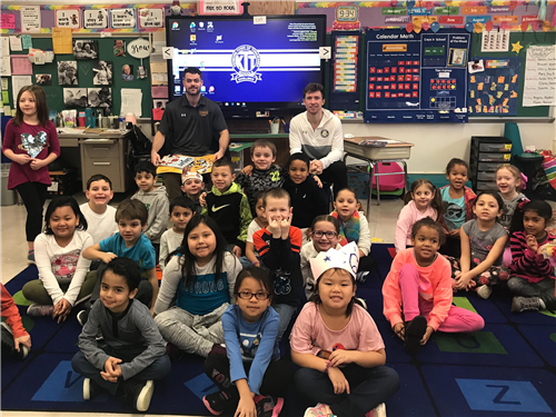 Students pose with Canisius College athletes 