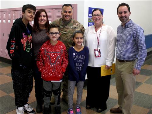 Pabon family poses with Lindbergh staff 