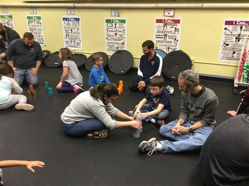 Students and parents at Fitness Night event 
