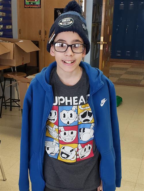 FMS student wearing new hat 