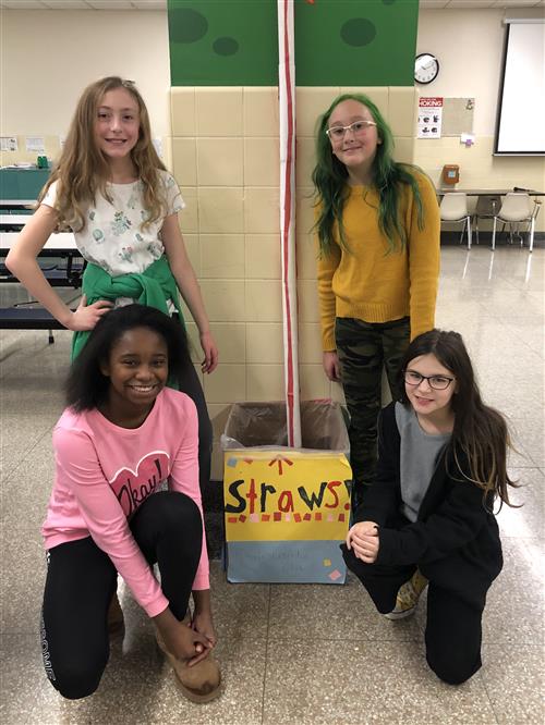 Hoover Middle students with giant straw and collection box Hoover Middle students with giant straw and collection box