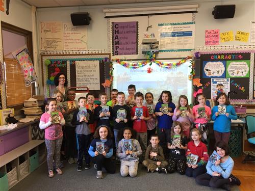 Students holding books 