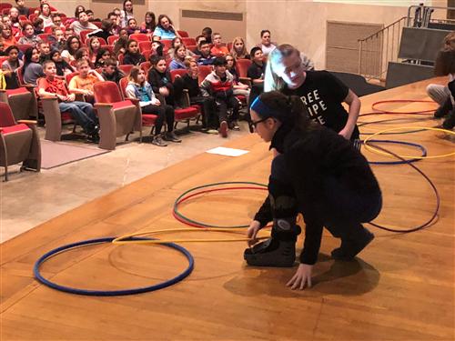 Students participate in assembly 