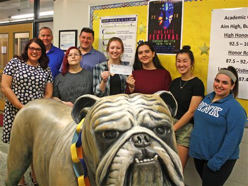 Kenmore East presents check to Kids Escaping Drugs 