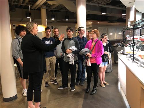 Students tour food court 