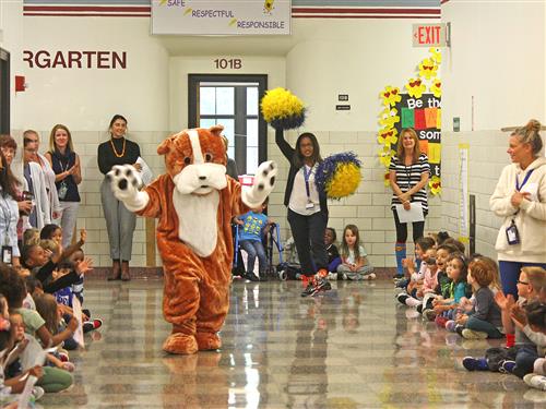 Bulldog mascot dances at school really 