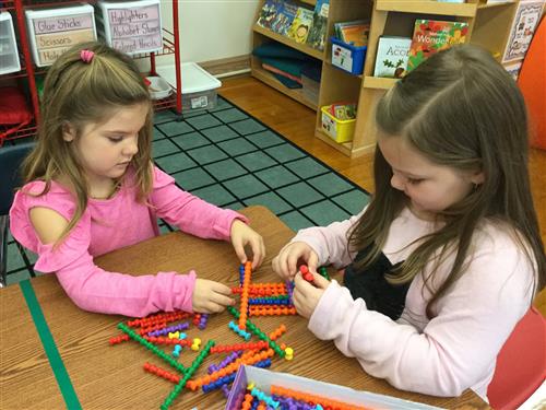 2 students playing with Playstix 