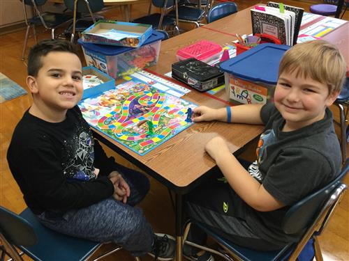 2 students playing Candy Land 