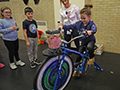  student making a smoothie using a blender bike