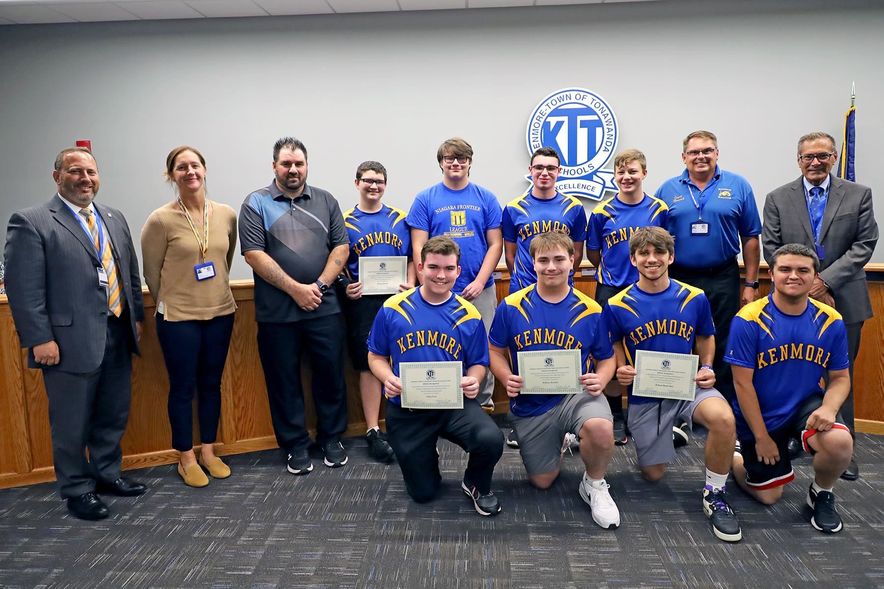 Section VI champions pose at board meeting