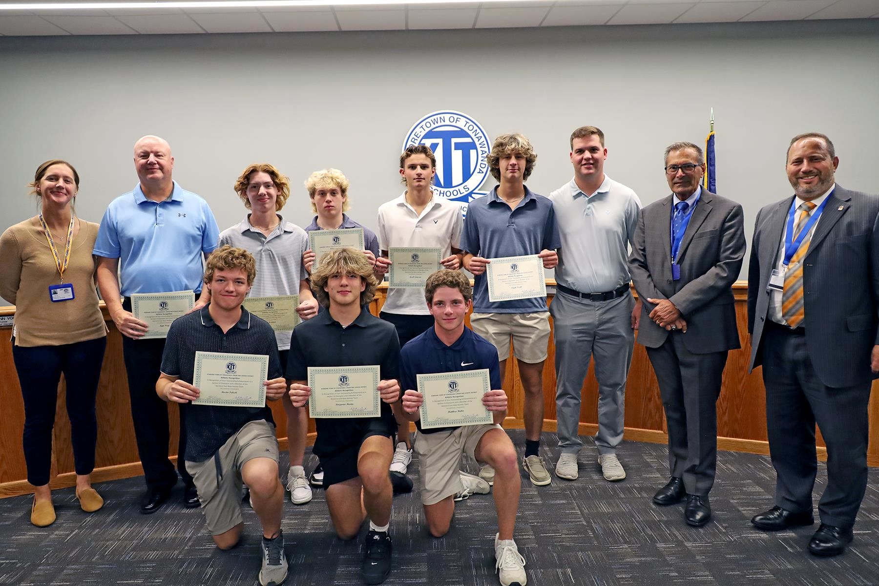 Section VI champions pose at board meeting