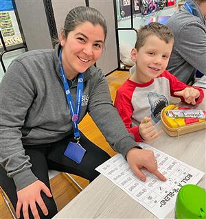 Sarah Galante (Big Picture) playing “Roll-a-Blend” with a student from Chelsea-Lyn Lewis’ class at Hoover Elementary