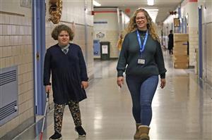 Teacher works with visually impaired student