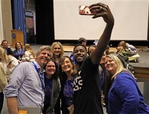 Ken Nwadike Jr. takes a selfie with Kenmore West staff