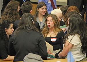 kenmore east student discusses topics at Model UN competition