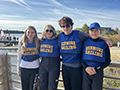  Kenmore students pose at a sailing competition