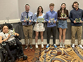  Ken-Ton student athletes pose with their awards following athletic seasons
